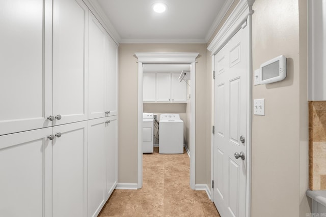 8 Cannon Ct, Little Rock, AR 72212 - hall featuring washer and dryer, ornamental molding, baseboards, and light tile patterned floors