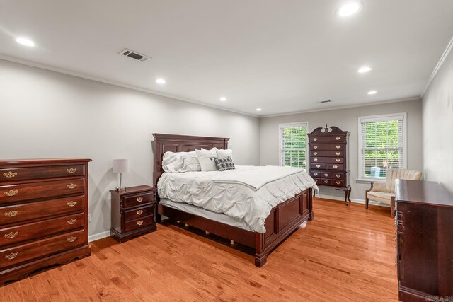 8 Cannon Ct, Little Rock, AR 72212 - bedroom featuring light wood-style flooring, ornamental molding, recessed lighting, and baseboards