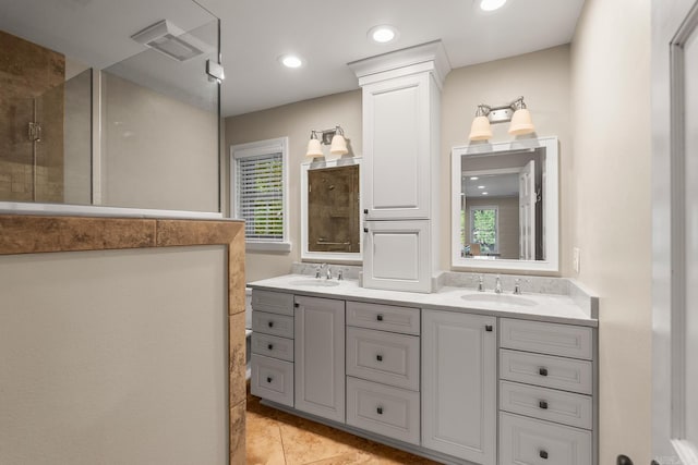 8 Cannon Ct, Little Rock, AR 72212 - full bath with tiled shower, double vanity, and recessed lighting