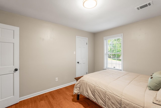 8 Cannon Ct, Little Rock, AR 72212 - bedroom with wood finished floors and baseboards
