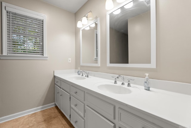 8 Cannon Ct, Little Rock, AR 72212 - full bathroom featuring baseboards, double vanity, and tile patterned flooring