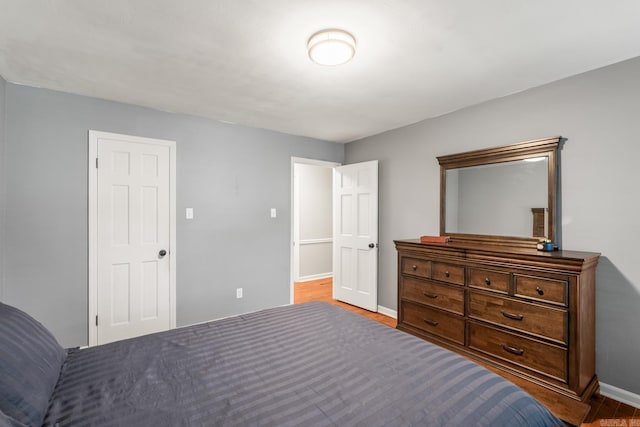8 Cannon Ct, Little Rock, AR 72212 - bedroom featuring baseboards and wood finished floors