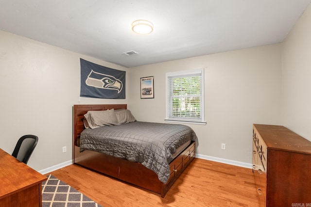 8 Cannon Ct, Little Rock, AR 72212 - bedroom with wood finished floors and baseboards