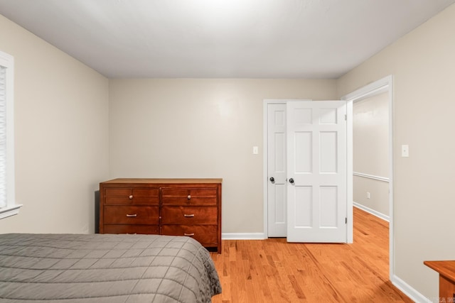 8 Cannon Ct, Little Rock, AR 72212 - bedroom with light wood-style flooring and baseboards