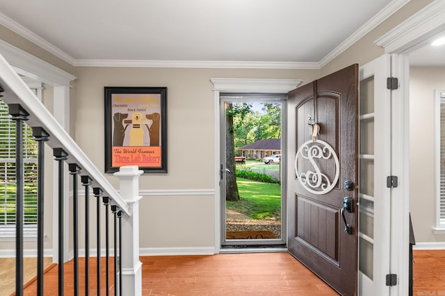 8 Cannon Ct, Little Rock, AR 72212 - entryway featuring ornamental molding, light wood finished floors, and baseboards