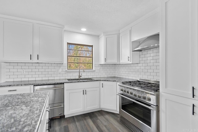 716 Vinson, Little Rock, AR 72205 - kitchen with stainless steel appliances, a sink, white cabinetry, light stone countertops, and a textured ceiling