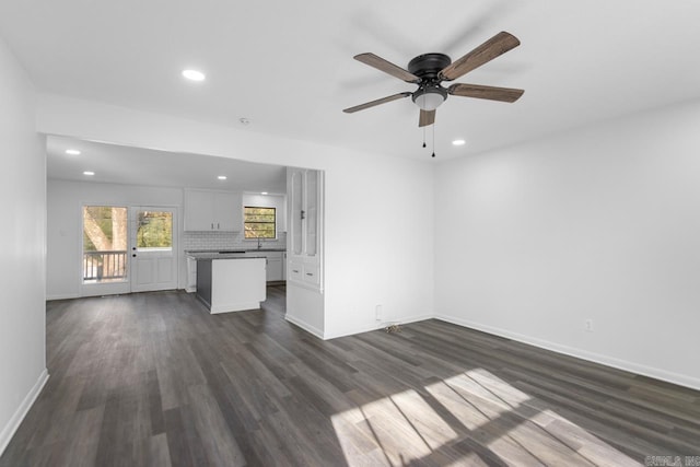 716 Vinson, Little Rock, AR 72205 - unfurnished living room with recessed lighting, dark wood finished floors, ceiling fan, and baseboards