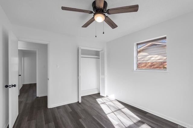 716 Vinson, Little Rock, AR 72205 - unfurnished bedroom with dark wood-type flooring, a closet, baseboards, and ceiling fan
