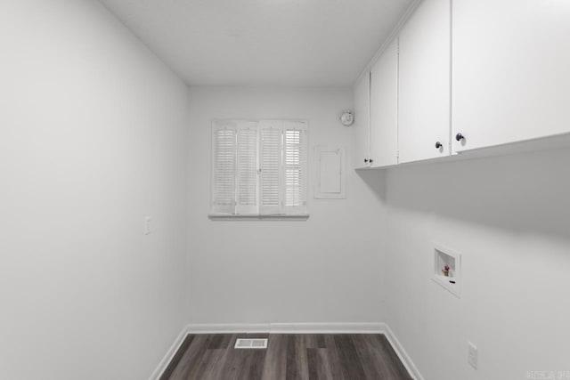 716 Vinson, Little Rock, AR 72205 - clothes washing area with cabinet space, washer hookup, baseboards, and dark wood-style floors