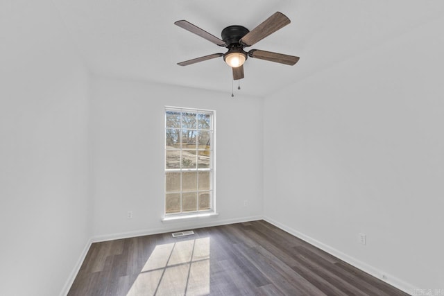 716 Vinson, Little Rock, AR 72205 - spare room featuring baseboards, a ceiling fan, and dark wood-style floors