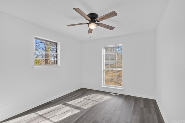 716 Vinson, Little Rock, AR 72205 - unfurnished room featuring wood finished floors, baseboards, and a ceiling fan