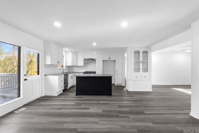 716 Vinson, Little Rock, AR 72205 - kitchen featuring stainless steel dishwasher, a center island, open floor plan, recessed lighting, and white cabinets