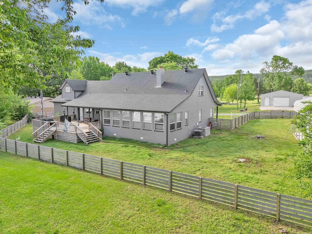 47 Lakeview Rd, Houston, AR 72070 - back of house featuring a wooden deck, roof with shingles, cooling unit, a detached garage, and a chimney