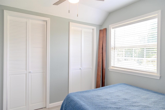 47 Lakeview Rd, Houston, AR 72070 - bedroom with two closets, lofted ceiling, baseboards, and a ceiling fan