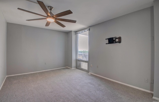 700 E 9th St Unit 9A, Little Rock, AR 72202 - carpeted empty room featuring a ceiling fan and baseboards