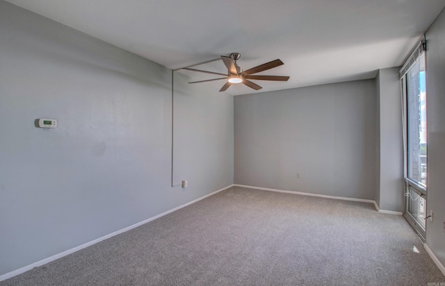700 E 9th St Unit 9A, Little Rock, AR 72202 - unfurnished room with ceiling fan, light colored carpet, and baseboards