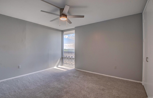 700 E 9th St Unit 9A, Little Rock, AR 72202 - carpeted empty room with a ceiling fan and baseboards