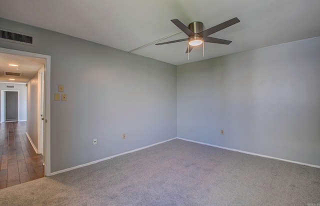 700 E 9th St Unit 9A, Little Rock, AR 72202 - carpeted empty room with a ceiling fan and baseboards