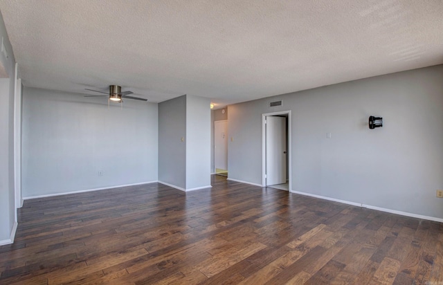 700 E 9th St Unit 9A, Little Rock, AR 72202 - unfurnished room featuring a textured ceiling, ceiling fan, dark wood finished floors, and baseboards