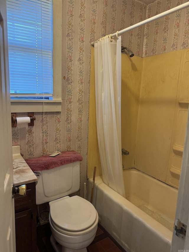bathroom with wallpapered walls, shower / tub combo with curtain, vanity, and toilet