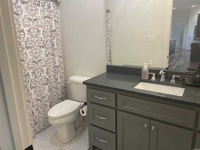 2009 Berkshire Dr, Benton, AR 72019 - full bath featuring toilet, vanity, and a shower with curtain