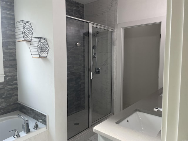 2009 Berkshire Dr, Benton, AR 72019 - full bath with a stall shower, a sink, and a bath