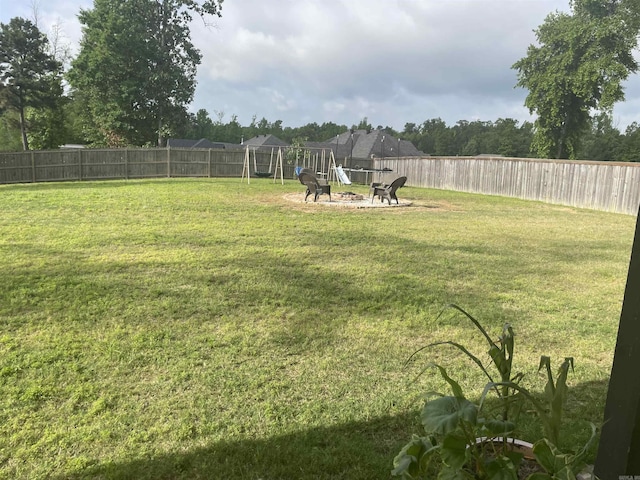 2009 Berkshire Dr, Benton, AR 72019 - view of yard featuring a playground and a fire pit