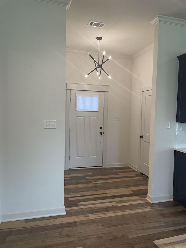 2009 Berkshire Dr, Benton, AR 72019 - entrance foyer with crown molding, a chandelier, baseboards, and dark wood-style flooring