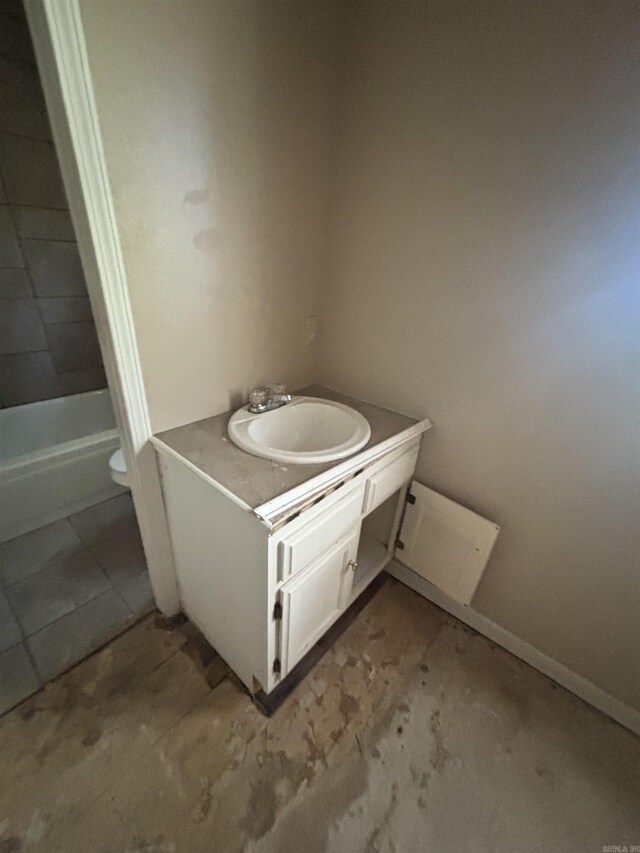 2015 Singleton Ct, Little Rock, AR 72204 - full bathroom with vanity, toilet, and baseboards