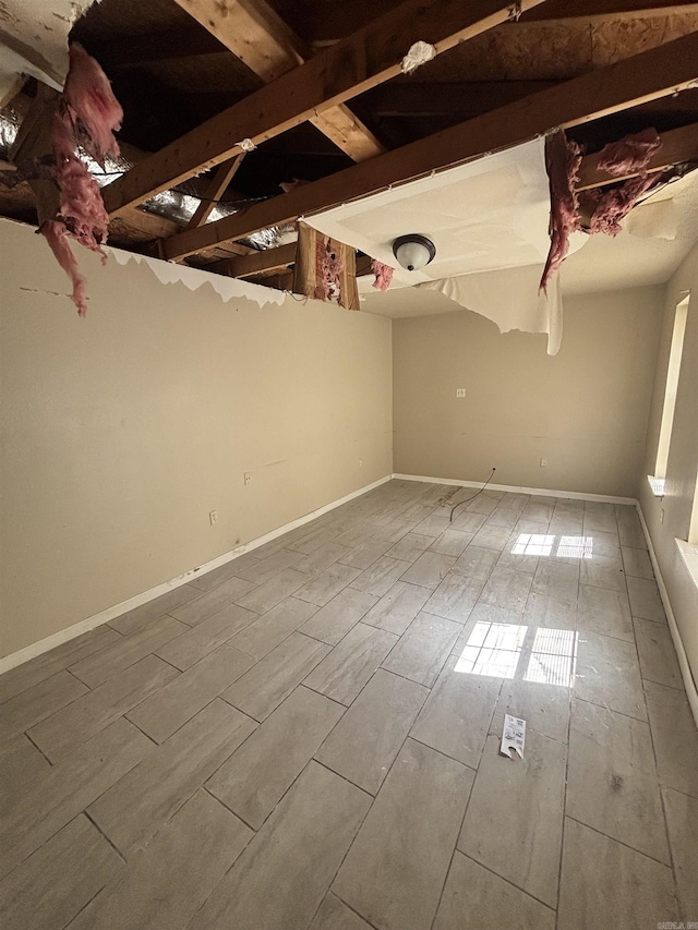 2015 Singleton Ct, Little Rock, AR 72204 - below grade area with baseboards and wood tiled floors
