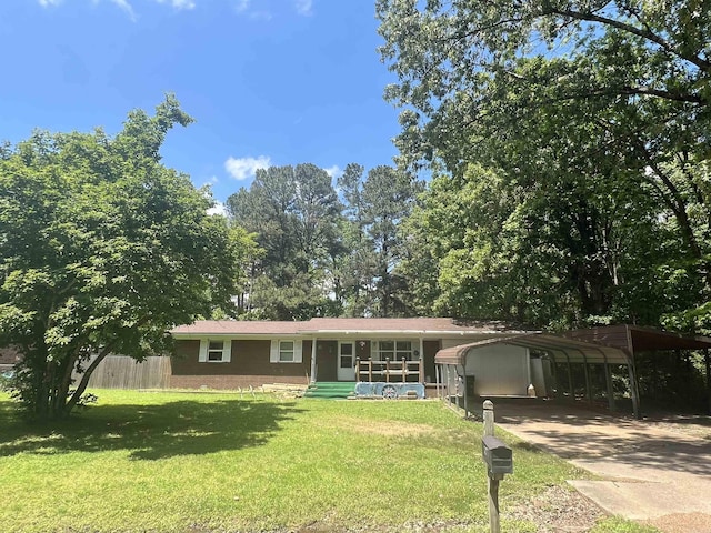 600 King St, Searcy, AR 72143 - view of front of property featuring a carport and concrete driveway