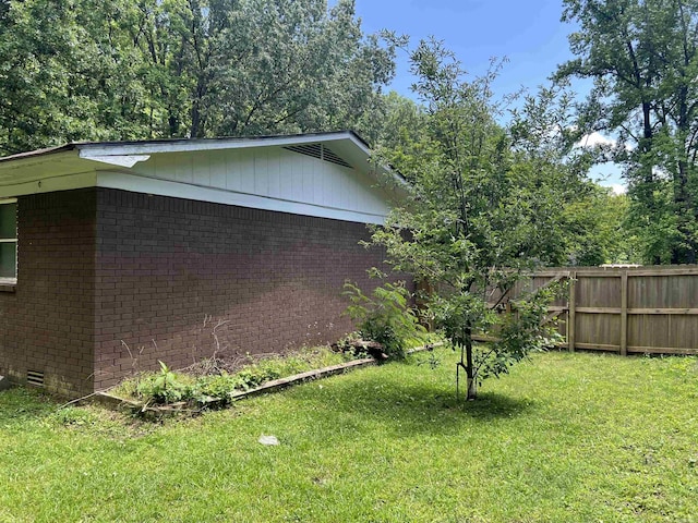 600 King St, Searcy, AR 72143 - view of side of property with brick siding and crawl space