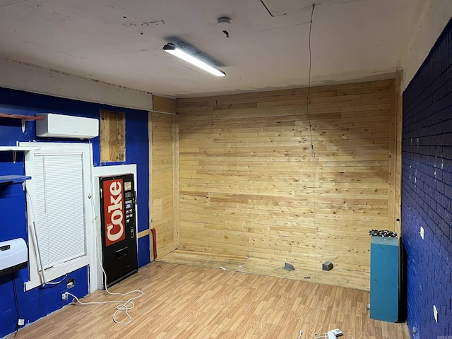 600 King St, Searcy, AR 72143 - interior space with wooden walls and light wood-style floors