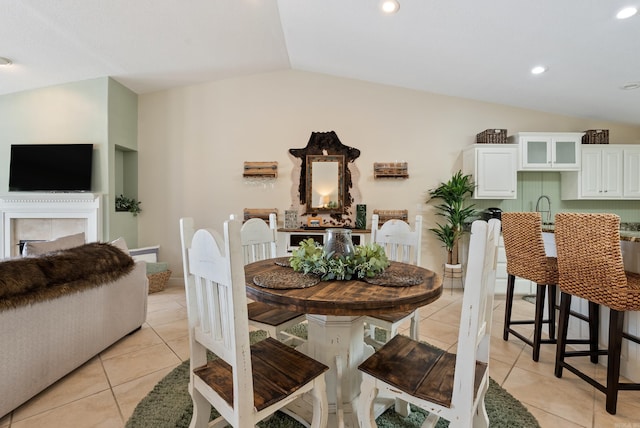 110 Jamison Ln, Hot Springs, AR 71913 - dining area with lofted ceiling, light tile patterned flooring, and recessed lighting