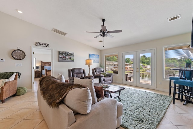 110 Jamison Ln, Hot Springs, AR 71913 - living room featuring light tile patterned flooring, plenty of natural light, ceiling fan, and vaulted ceiling