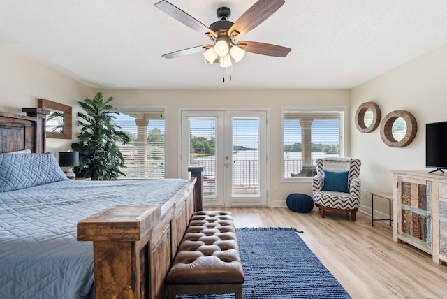 110 Jamison Ln, Hot Springs, AR 71913 - bedroom with access to outside, multiple windows, light wood-type flooring, and baseboards