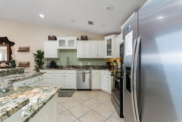 110 Jamison Ln, Hot Springs, AR 71913 - kitchen featuring stainless steel appliances, white cabinets, vaulted ceiling, glass insert cabinets, and recessed lighting