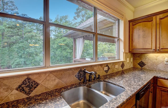 32 Bronte Ct, Little Rock, AR 72223 - kitchen with a sink, stainless steel dishwasher, backsplash, brown cabinets, and crown molding