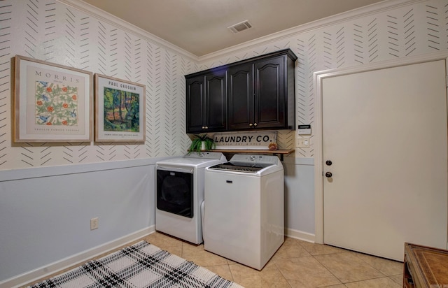 32 Bronte Ct, Little Rock, AR 72223 - washroom with washing machine and dryer, cabinet space, crown molding, light tile patterned flooring, and baseboards
