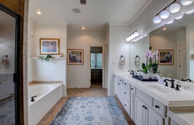 32 Bronte Ct, Little Rock, AR 72223 - bathroom with a garden tub, double vanity, ornamental molding, baseboards, and recessed lighting
