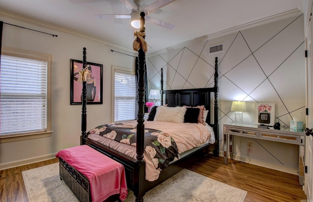 32 Bronte Ct, Little Rock, AR 72223 - bedroom with wood finished floors, baseboards, crown molding, and ceiling fan