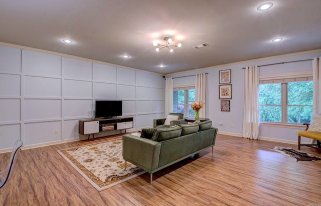 32 Bronte Ct, Little Rock, AR 72223 - living room with light wood-style floors, ornamental molding, baseboards, a chandelier, and recessed lighting