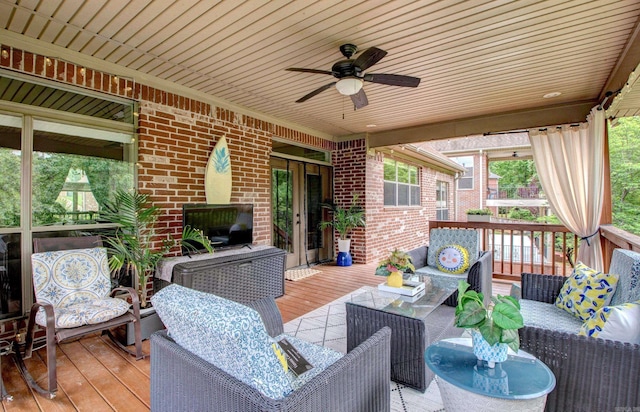 32 Bronte Ct, Little Rock, AR 72223 - wooden deck with an outdoor hangout area and a ceiling fan