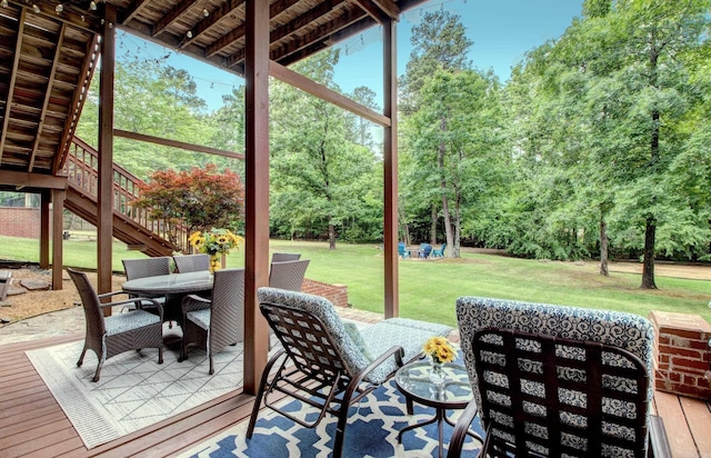 32 Bronte Ct, Little Rock, AR 72223 - sunroom / solarium with outdoor dining space and view of scattered trees