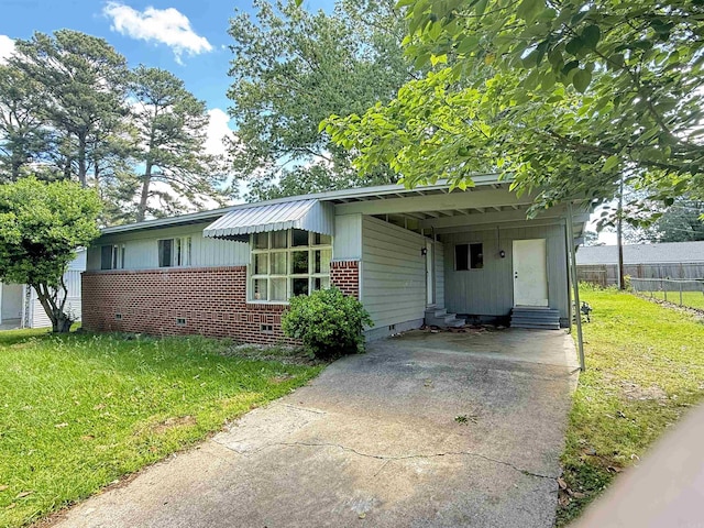 13 Wanda Ln, Little Rock, AR 72209 - bungalow featuring entry steps, concrete driveway, brick siding, and a carport