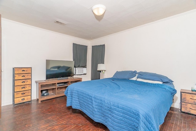 2616 Stallings Ln, Jonesboro, AR 72401 - bedroom with wood-type flooring and ornamental molding