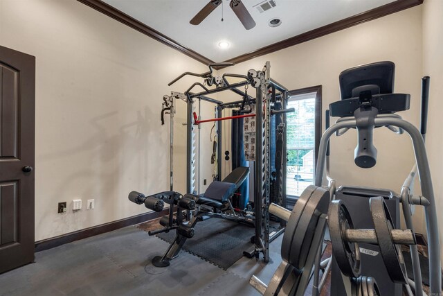 workout area featuring ornamental molding, a ceiling fan, and baseboards
