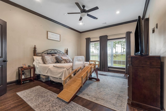 bedroom featuring ornamental molding, dark wood-style flooring, recessed lighting, ceiling fan, and baseboards
