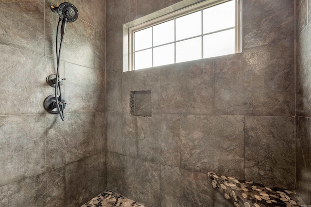 bathroom view of tiled shower