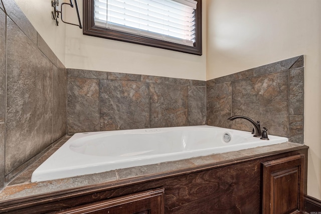 full bathroom featuring a bath